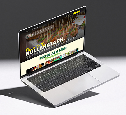 Website des Bullenstall Duisburg auf einem Laptop
